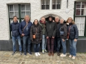 Teambuilding AV-Nowedo: Rondleiding in stad Brugge & etentje